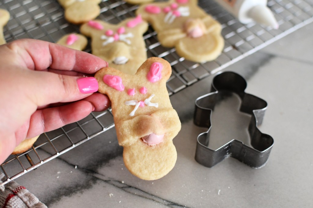 bunny cookie next to a gingerbread man cutter