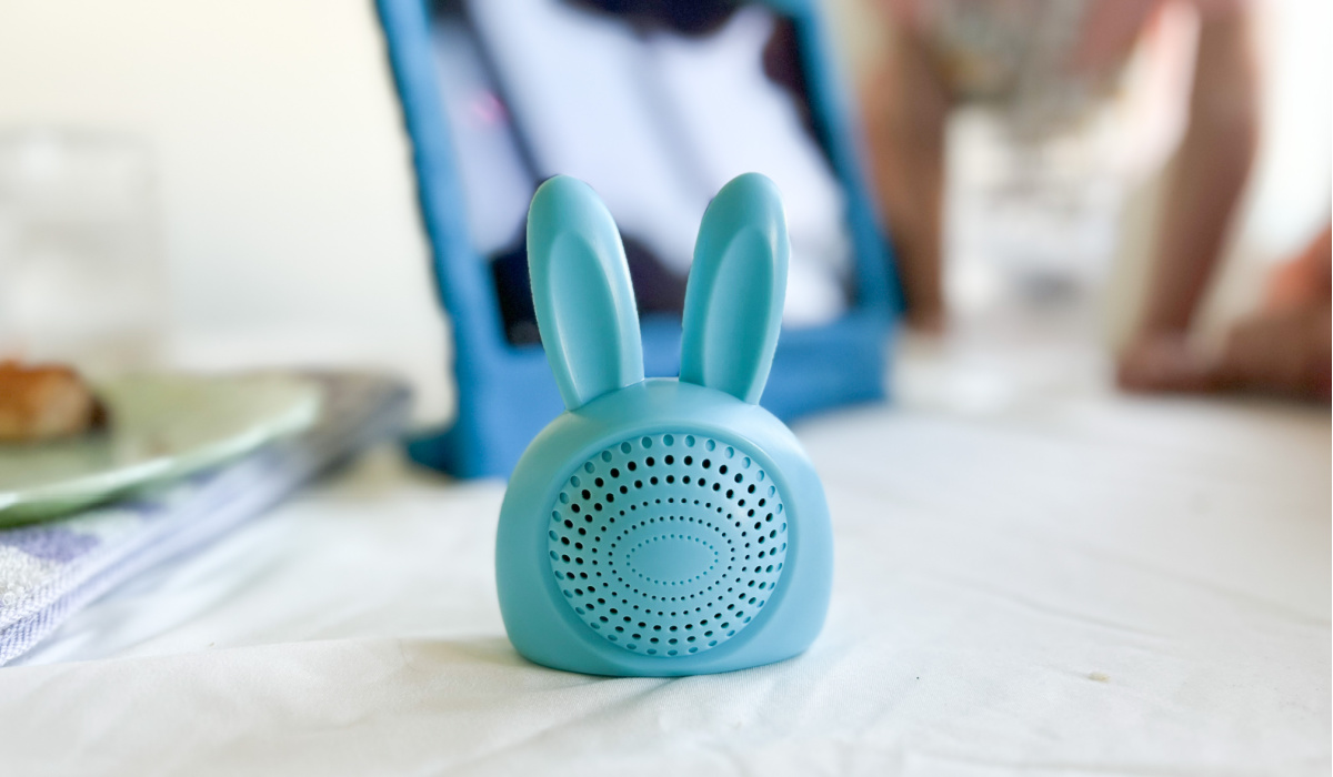 blue bunny speaker in front of blue ipad