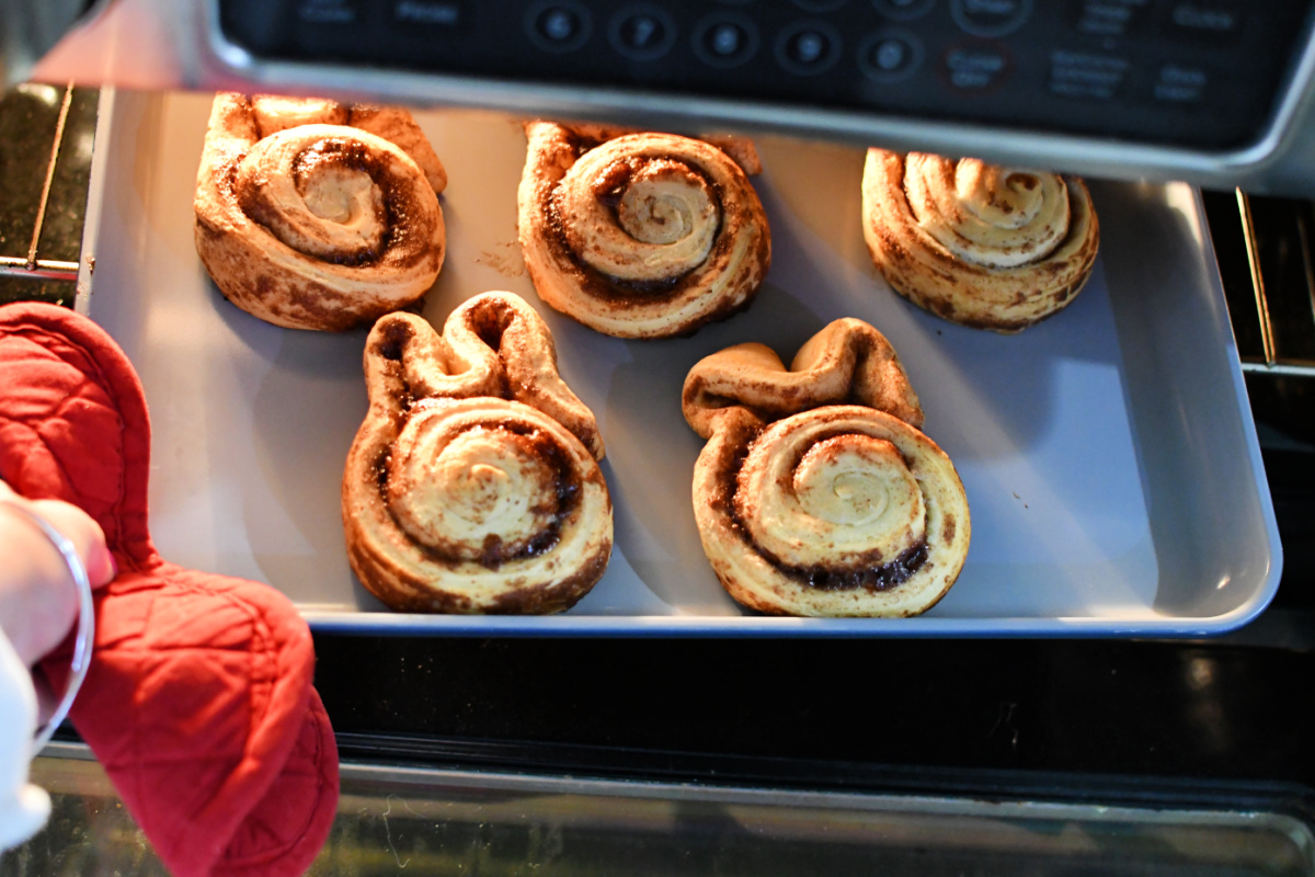 cinnamon roll bunnies in the oven after baking