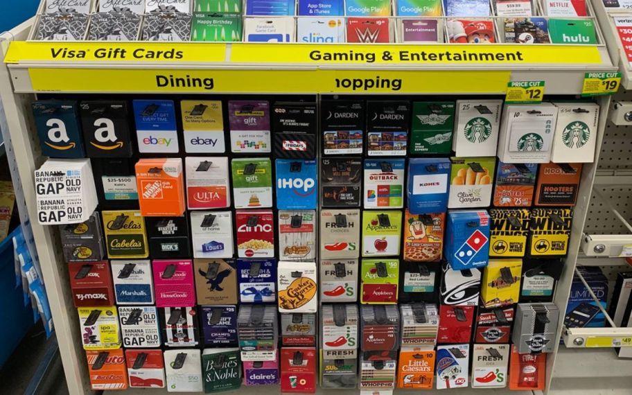 gift cards on a display rack in a dollar general store