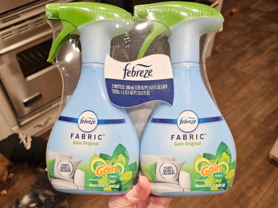 hand holding febreze two pack 