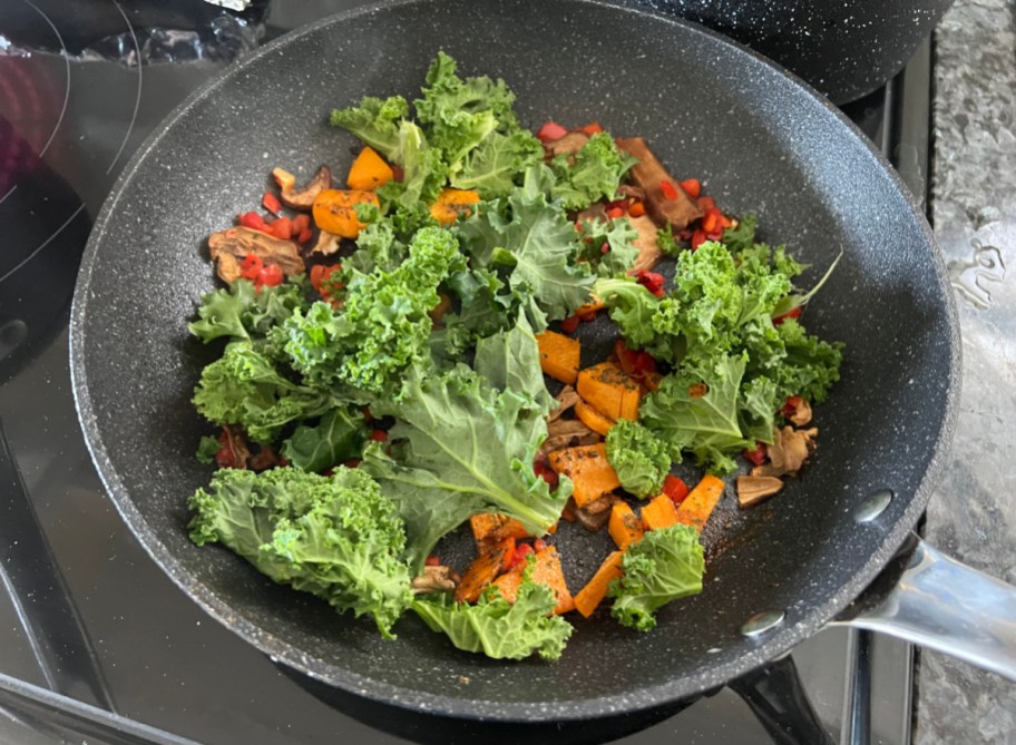 kale and veggies in pan