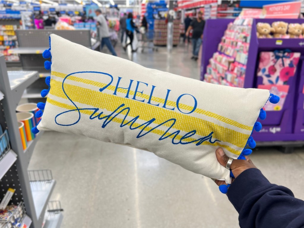 hello summer accent pillow in woman's hand