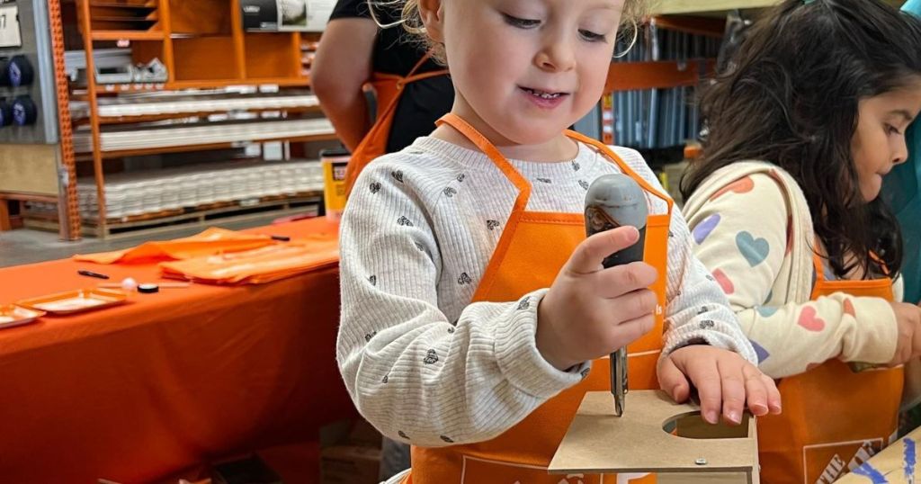 Girl working on a project at The Home Depot