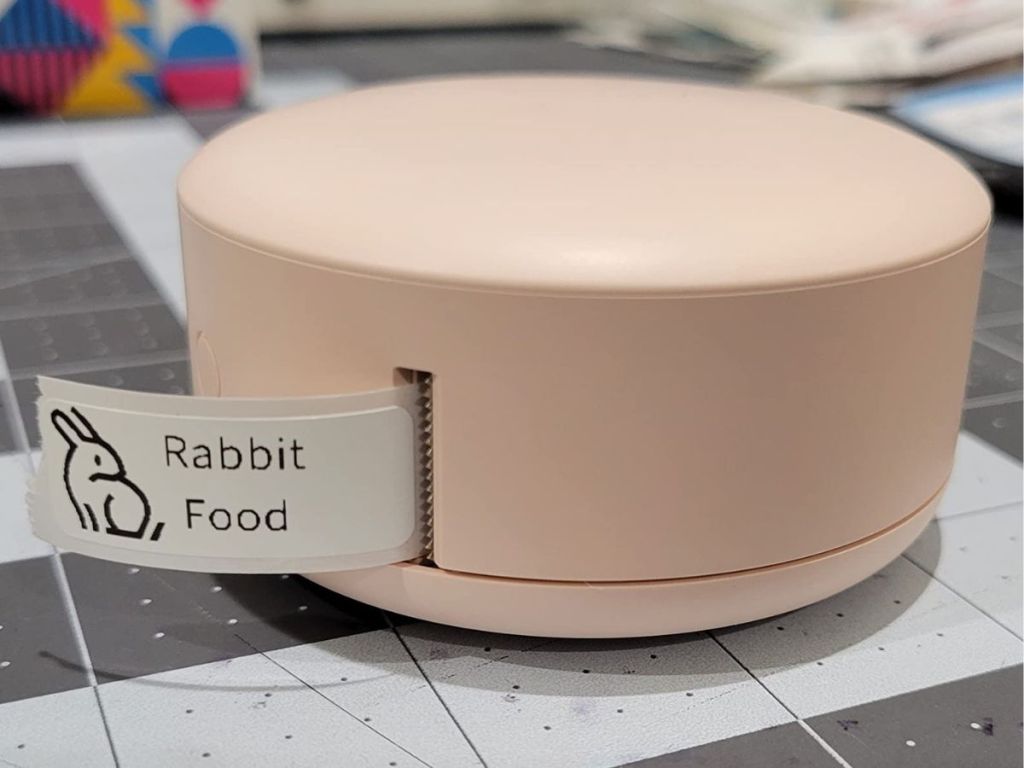 iDPRT Label Maker in Pink with label coming out of it that says Rabbit Food with a picture of a bunny rabbit