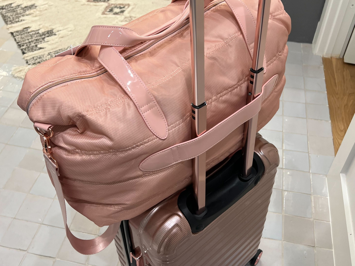 iFly Travel Weekender Bag w_ Adjustable Shoulder Straps on a luggage