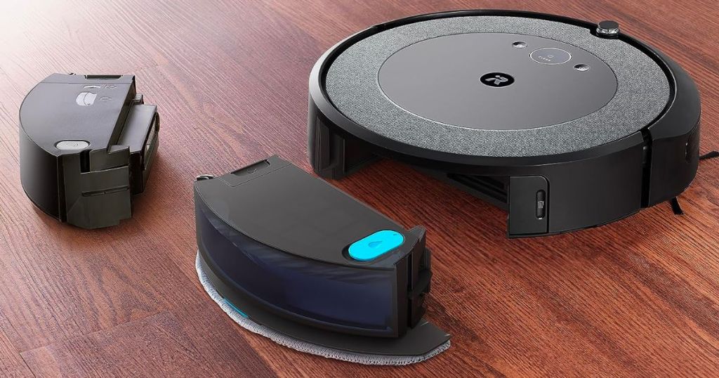 iRobot Roomba Combo i5 Robot Vacuum and Mop displayed with its vacuum tank and vacuuming & mopping tank on a hardwood floor
