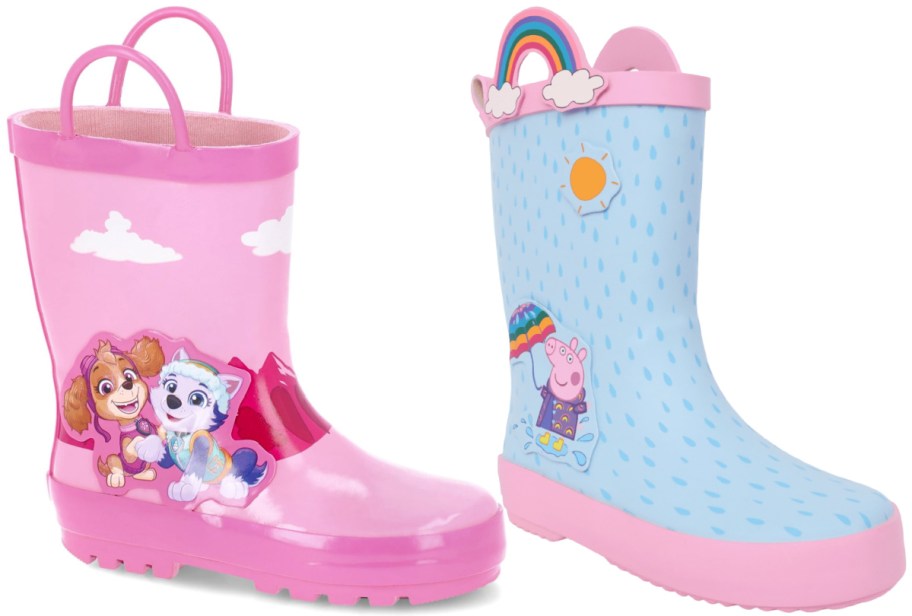 Two colorful children's rain boots: one pink with Paw Patrol characters and clouds, the other blue with a rainbow, sun, and Peppa Pig.