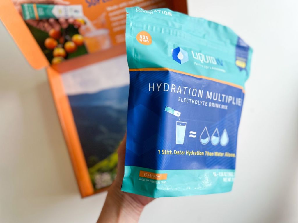 hand holding Liquid IV Hydration Multiplier bag