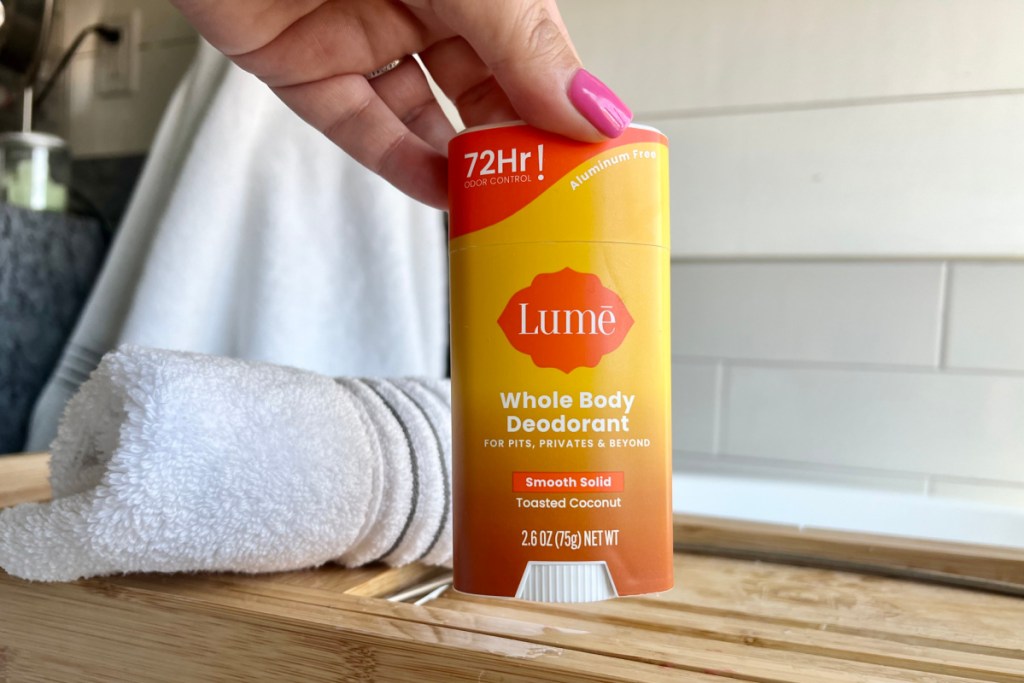 hand grabbing stick deodorant