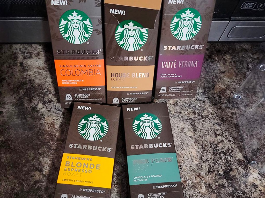 5 starbucks nespresso capsule boxes on countertop