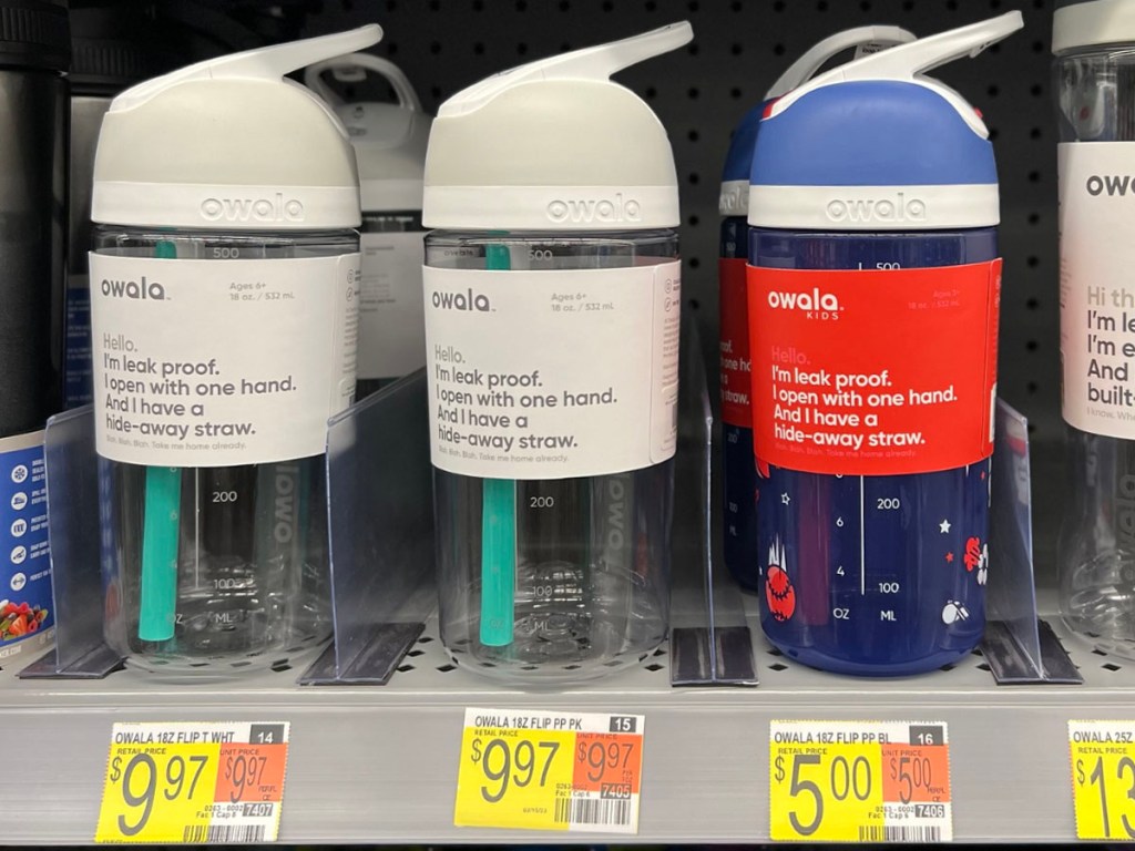 gray and blue kids owala water bottles on shelf