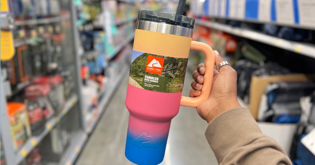 hand holding ombre ozark trail tumbler
