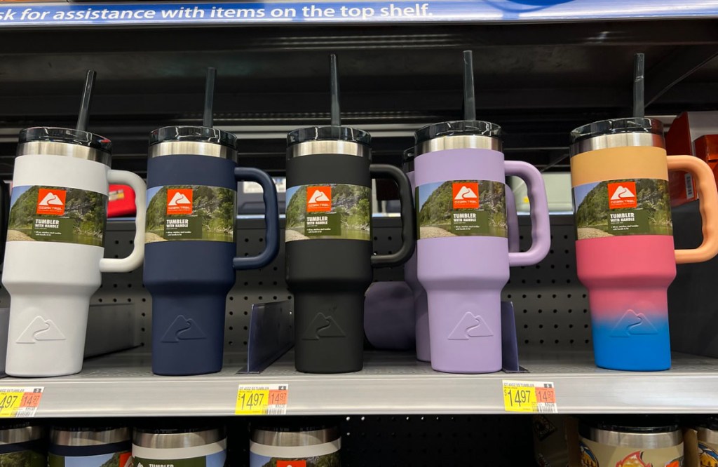 white, blue, black purple and ombre colored tumblers on shelf at Walmart
