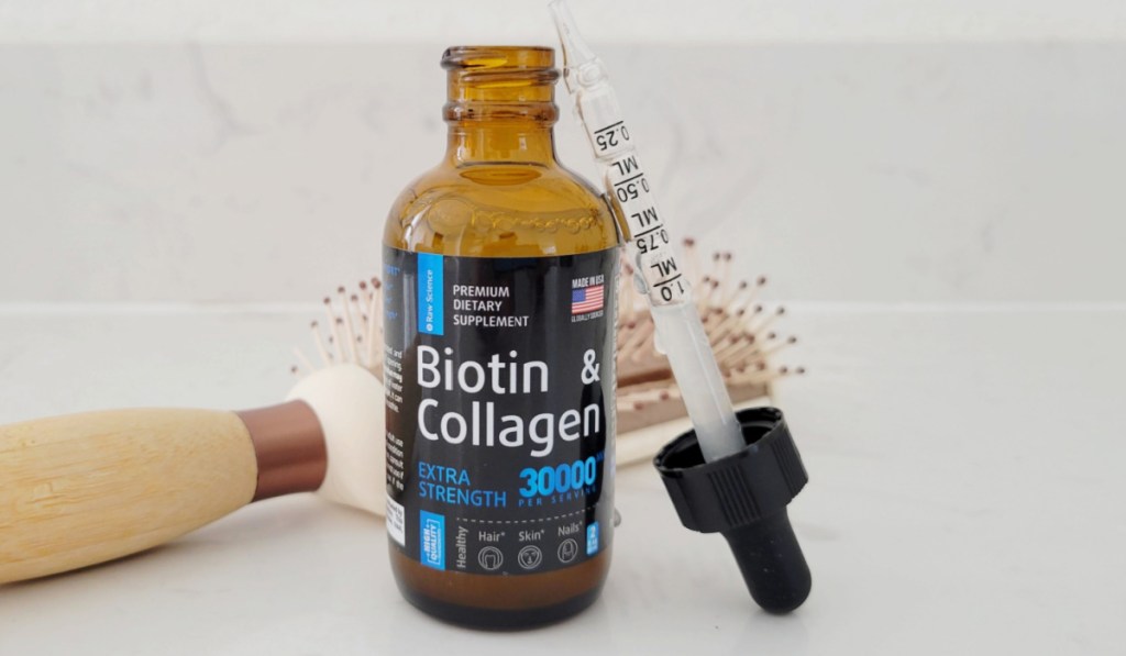 dropper leaning against liquid collagen bottle