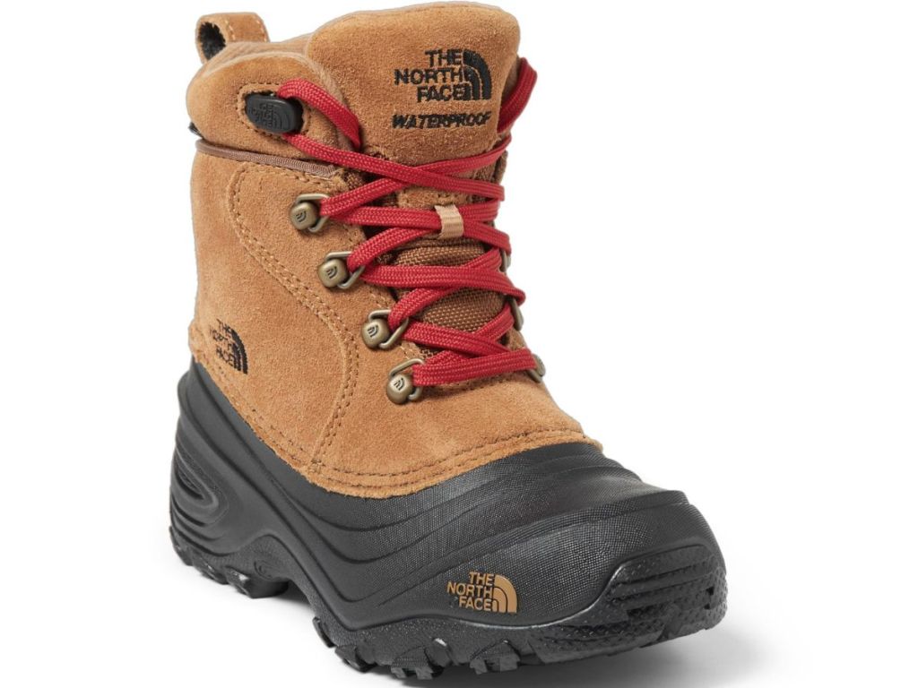 The North Face tan and black boot with red laces 