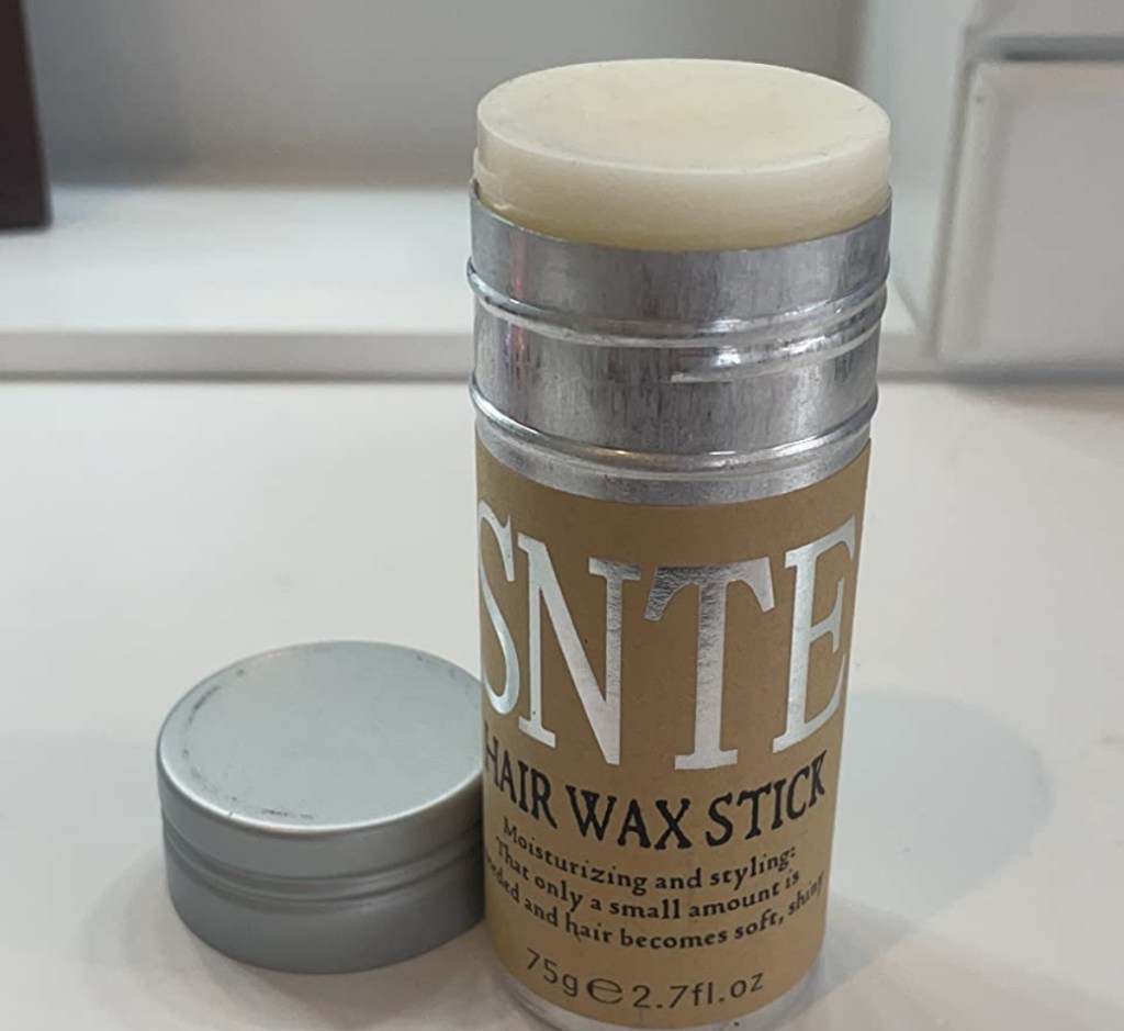 hair wax stick with the lid off