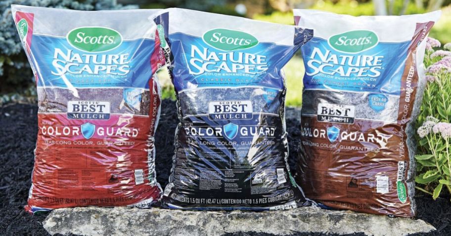red, black and brown Scotts Nature Scapes bags of mulch standnig side by side