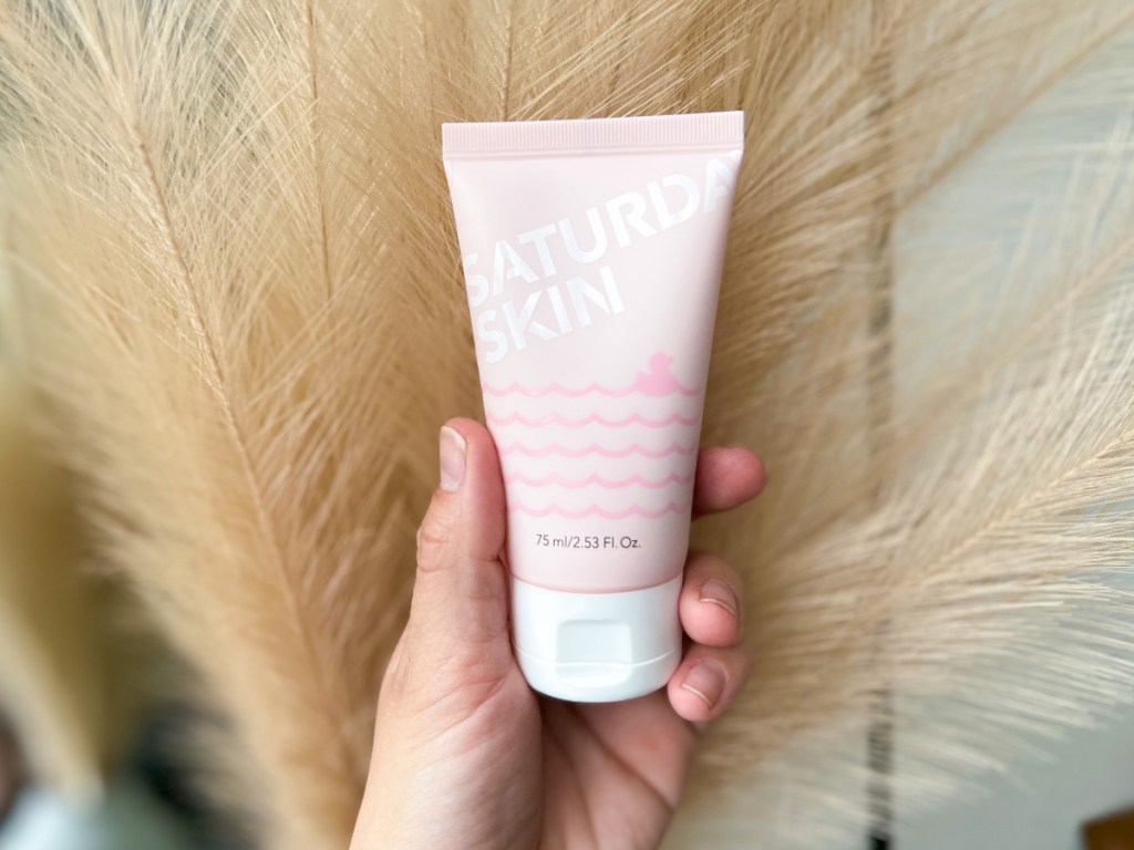 skincare from Allure in woman's hand