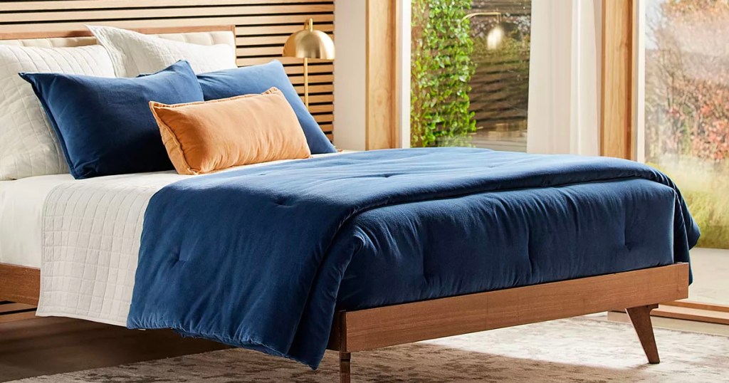 sonoma goods dark blue comforter on bed