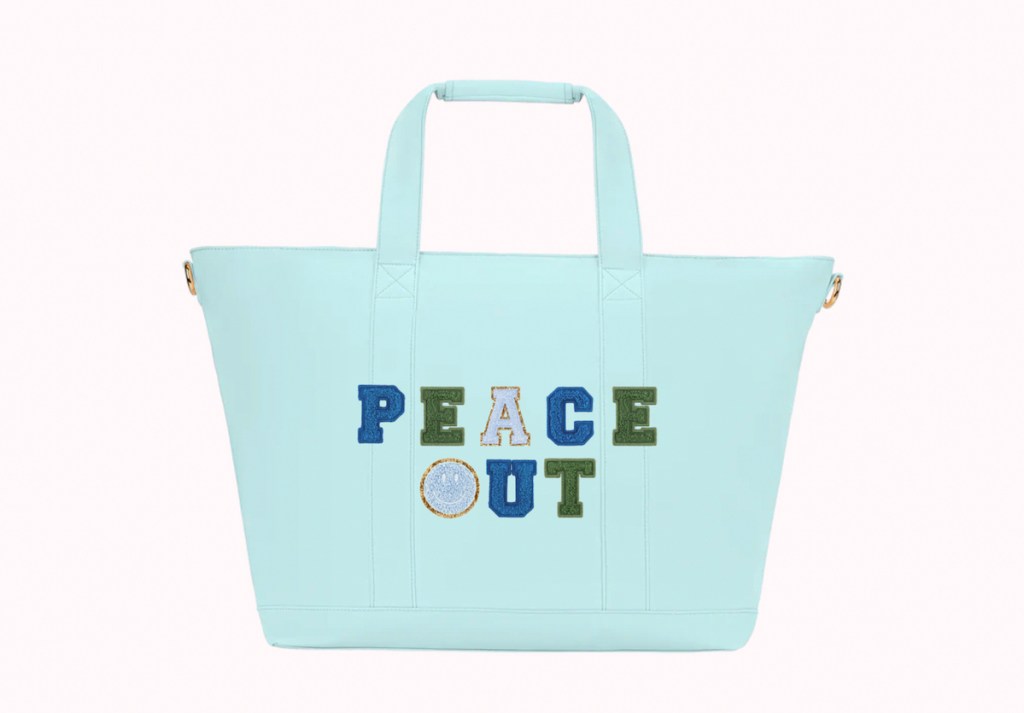 stock photo of blue tote bag peace out