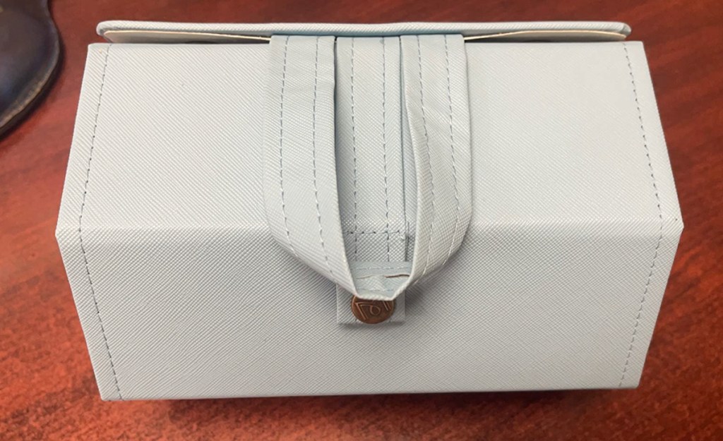 close up of white sunglasses case 