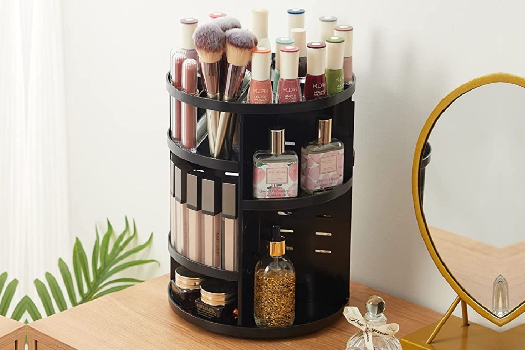 black makeup tower with makeup in it