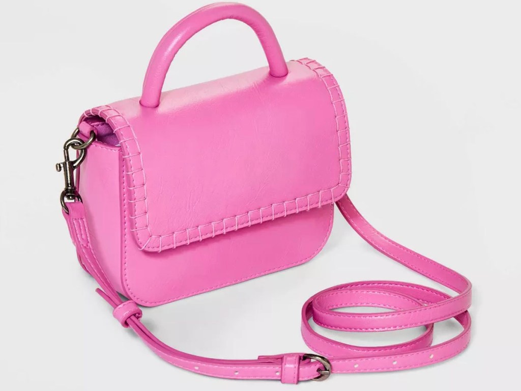 pink crossbody purse stock image
