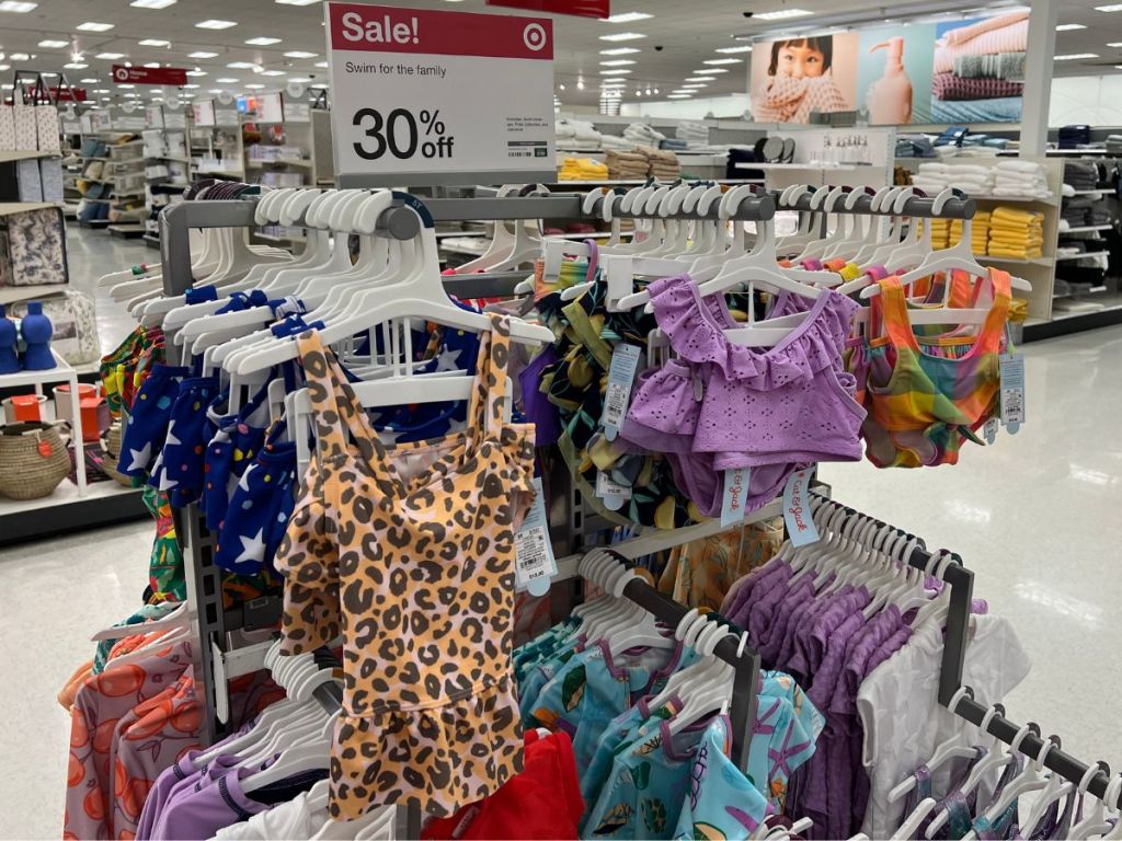 rack of kids swimsuits in Target