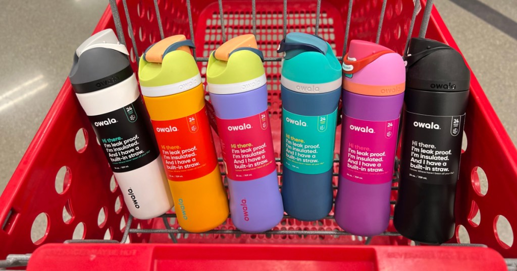 colorful owala water bottles lined up in a target shopping cart