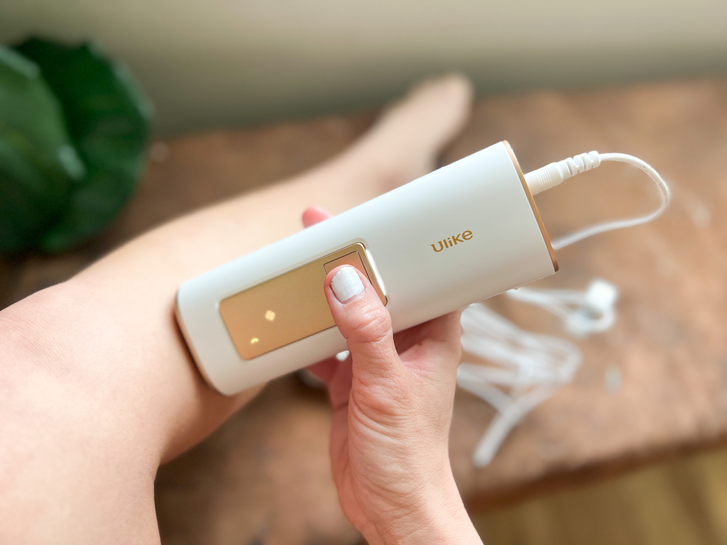 woman using Ulike laser hair removal system 