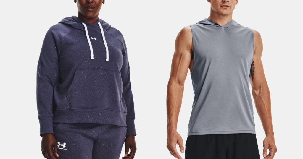 woman wearing navy hoodie with Under Armour logo at the top and man wearing gray hooded sleeveless hoodie
