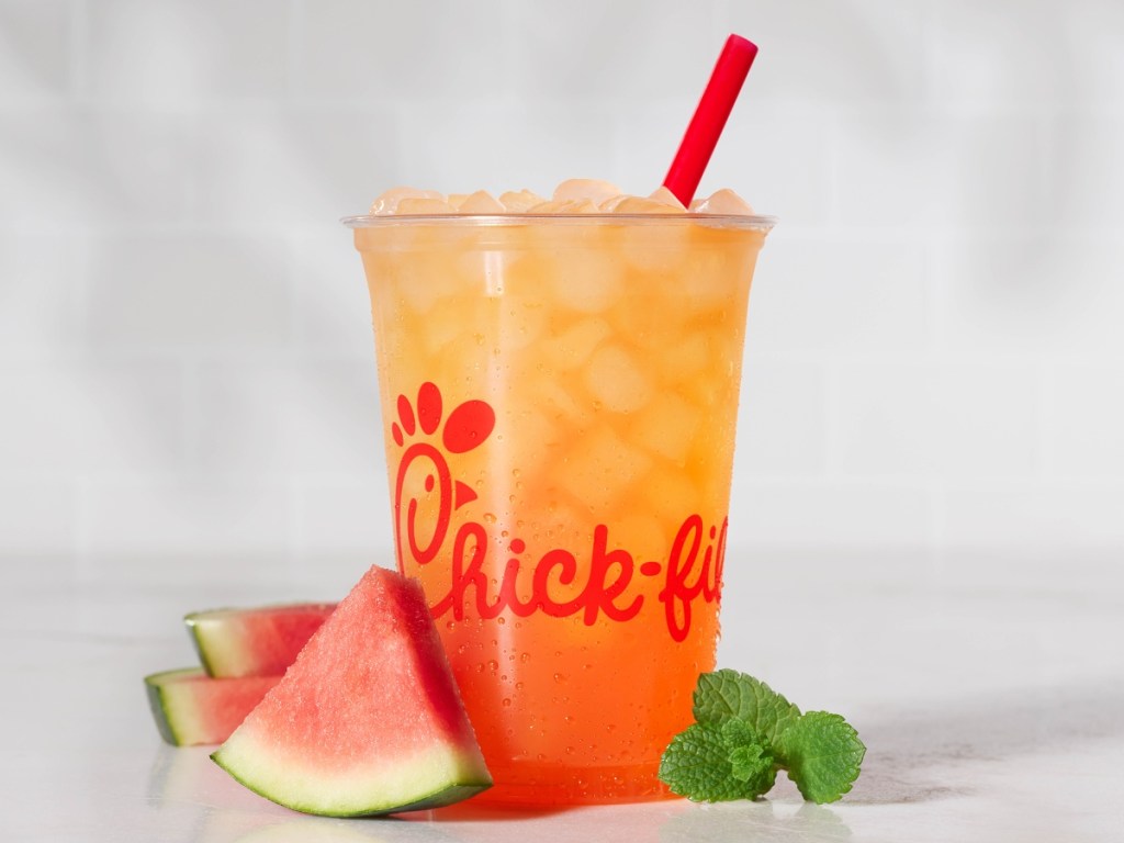 Chick-fil-A lemonade next to watermelon slice and mint sprig