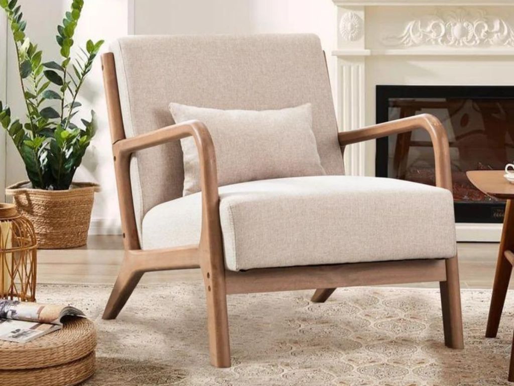 beige cushioned wood armchair in living room