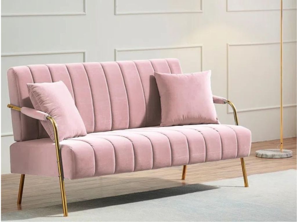 pink upholstered loveseat in living room