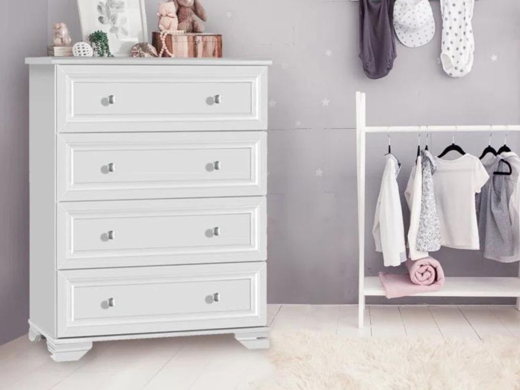 white 4-drawer dresser in kids room