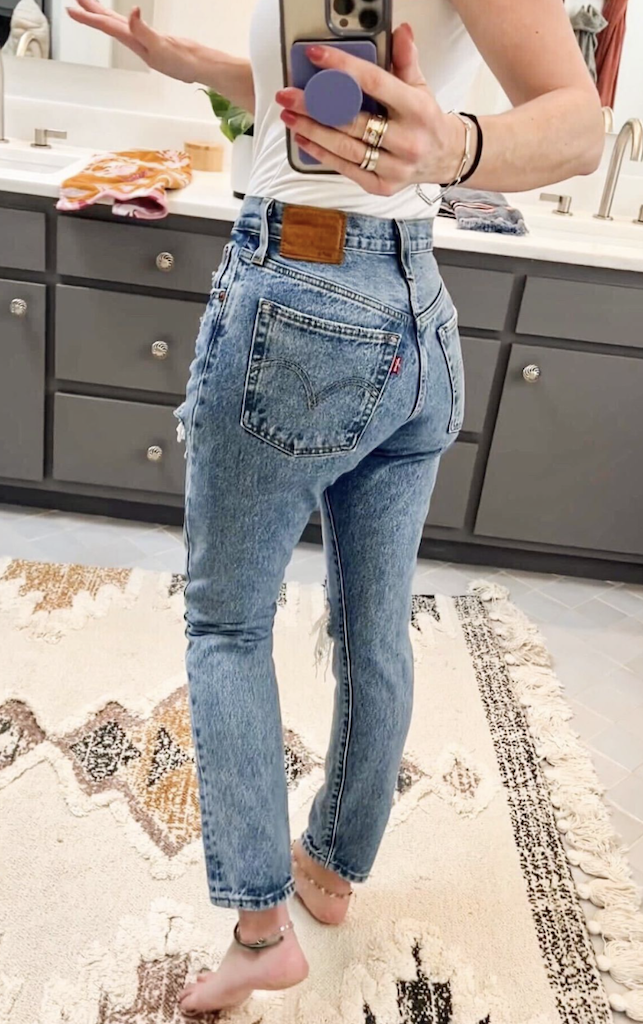 woman wearing Levi's jeans