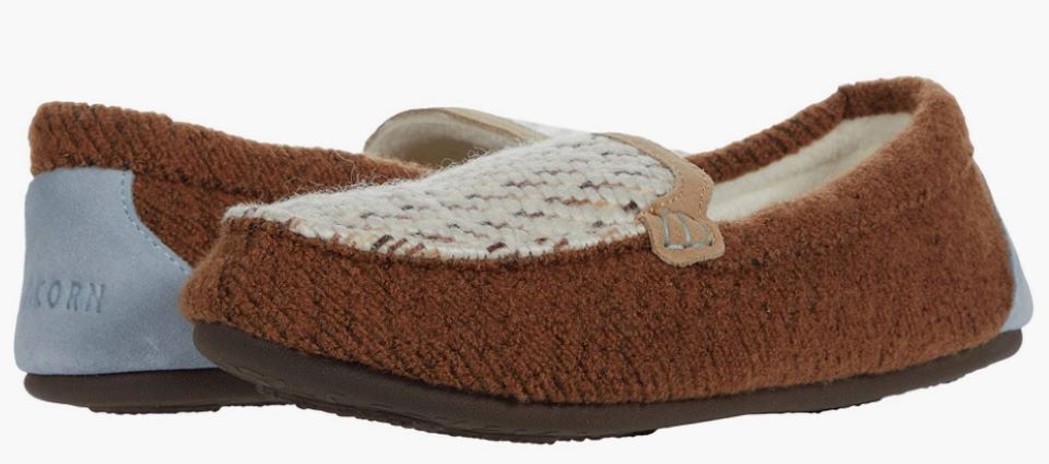 Pair of brown moccasin slippers with a white top