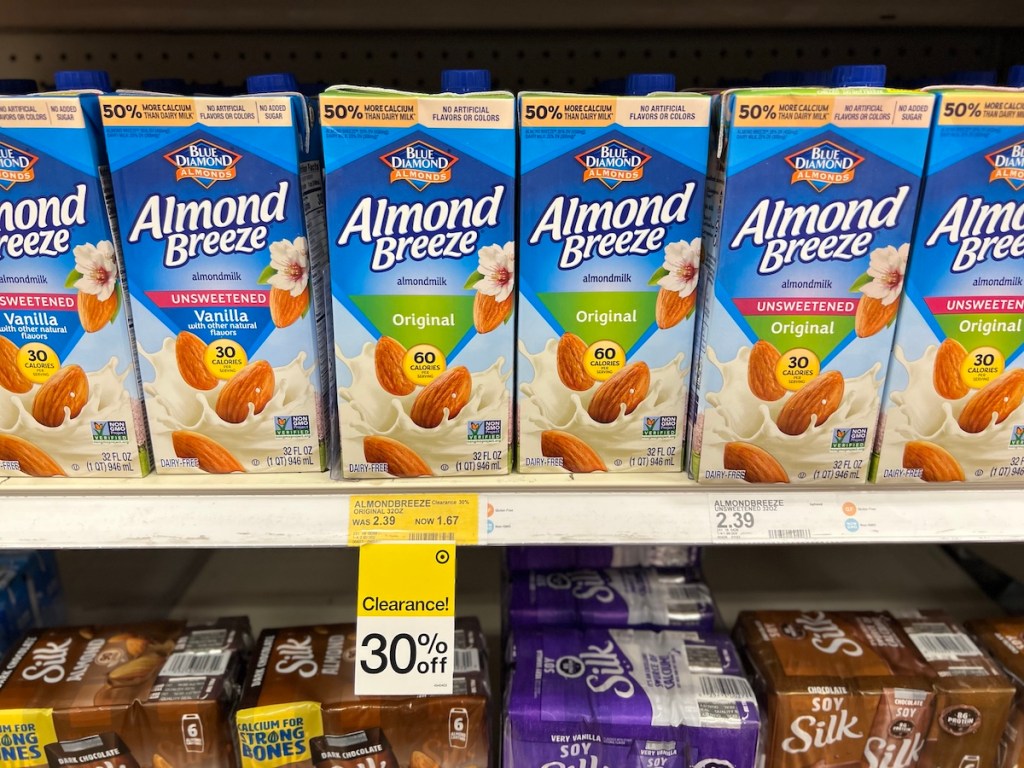 Row of Almond Breeze milks on a shelf at Target