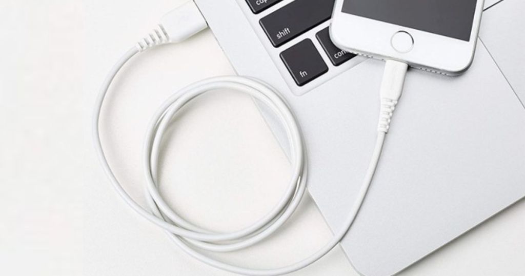 amazon basics charger plugged into a macbook and an iphone