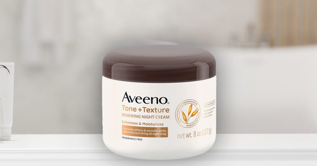 Aveeno Tone + Texture Renewing Body Night Cream on bathroom counter