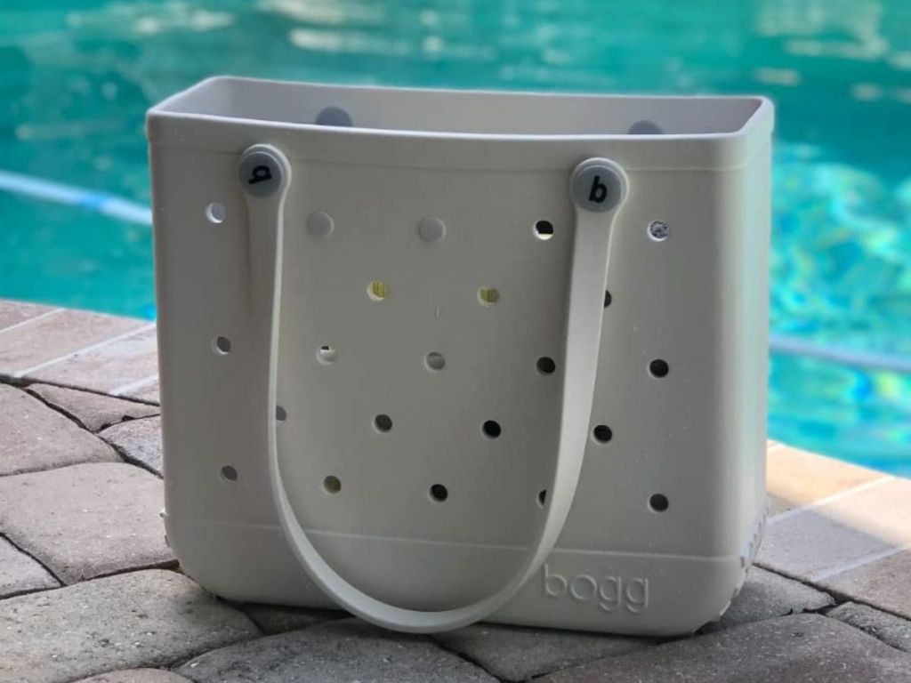 Baby Bogg Bag in white by the pool