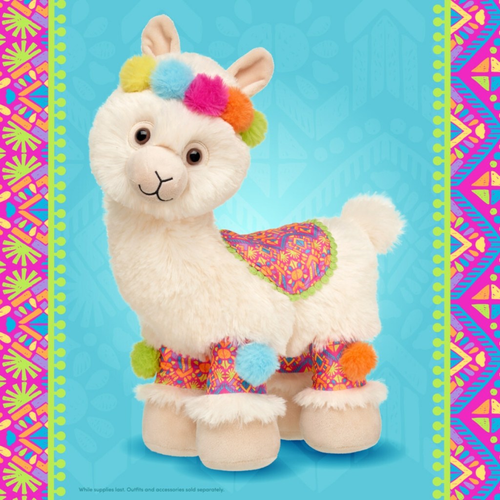 plush alpaca with colorful poms