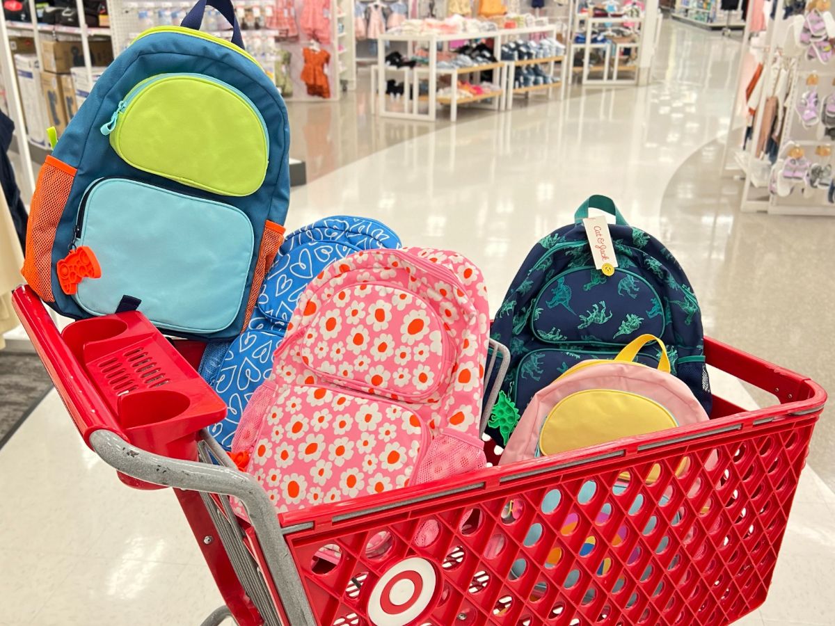 A Target cart filled with backpacks