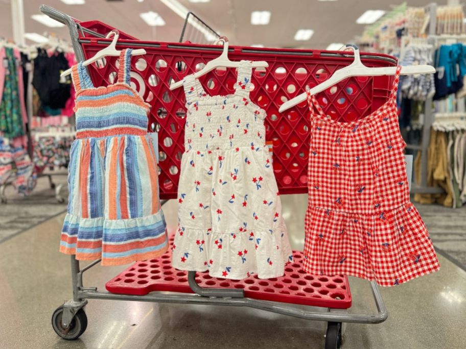 3 Cat and Jack Sundresses on a cart at Target
