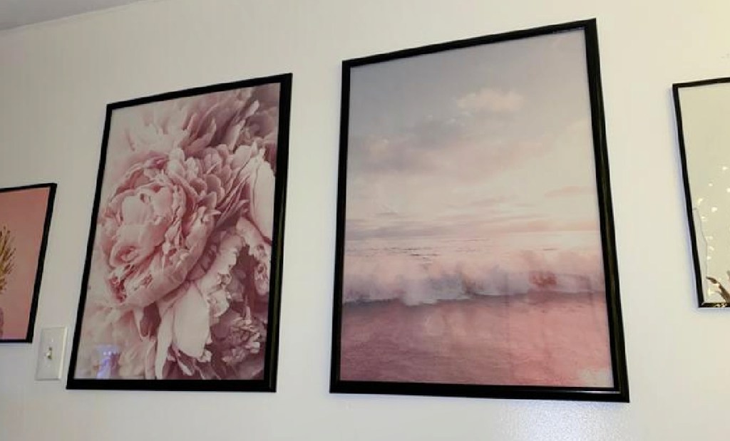 Artwork installed with heavy duty command strips used for picture hanging