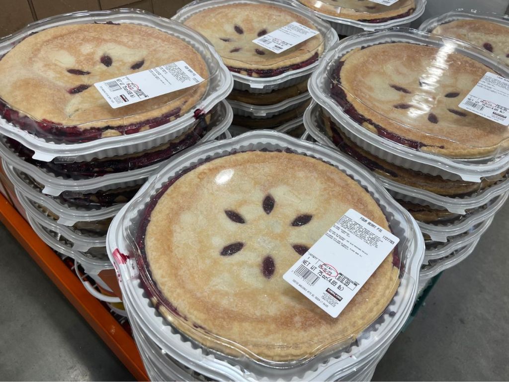 Stacks of four berry pies at Costco