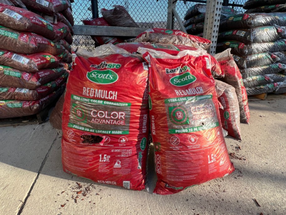 bags of red colored EarthGro Mulch at Home Depot store