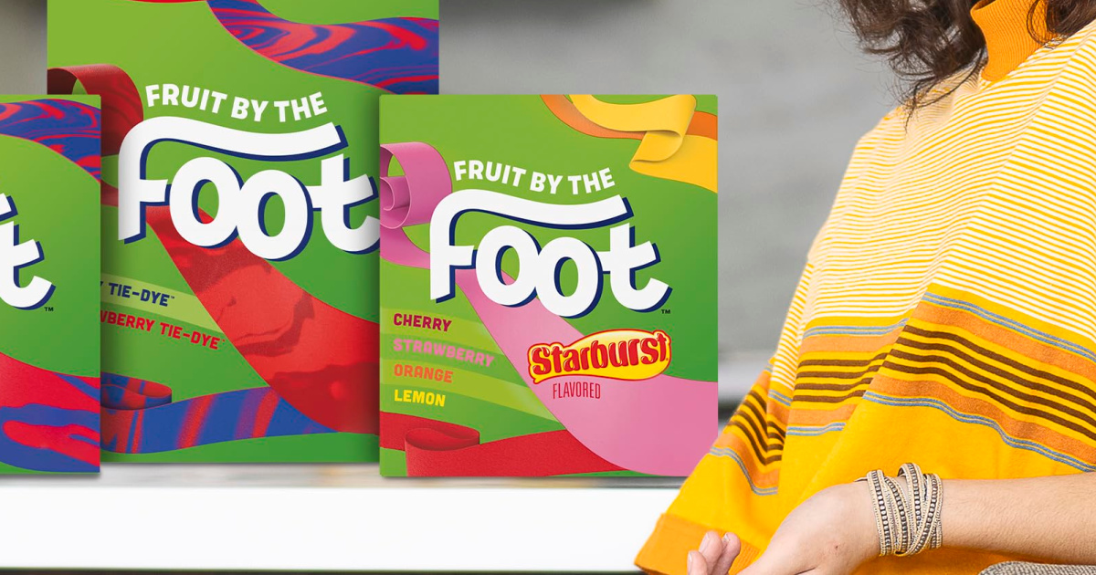 New Fruit by the Foot packaging on the counter next to girl in yellow 