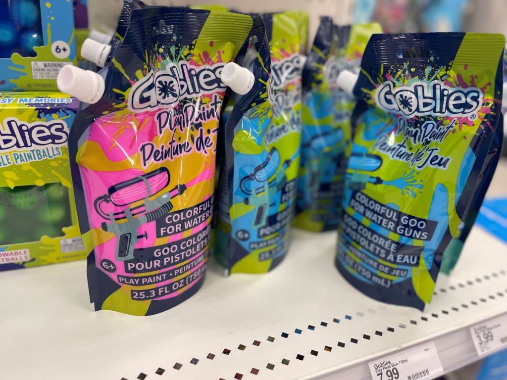 Bags of goblies paint on the shelf at a store